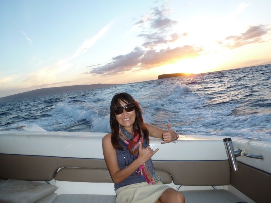 Jeanne with the sunset over Molokini, Maui